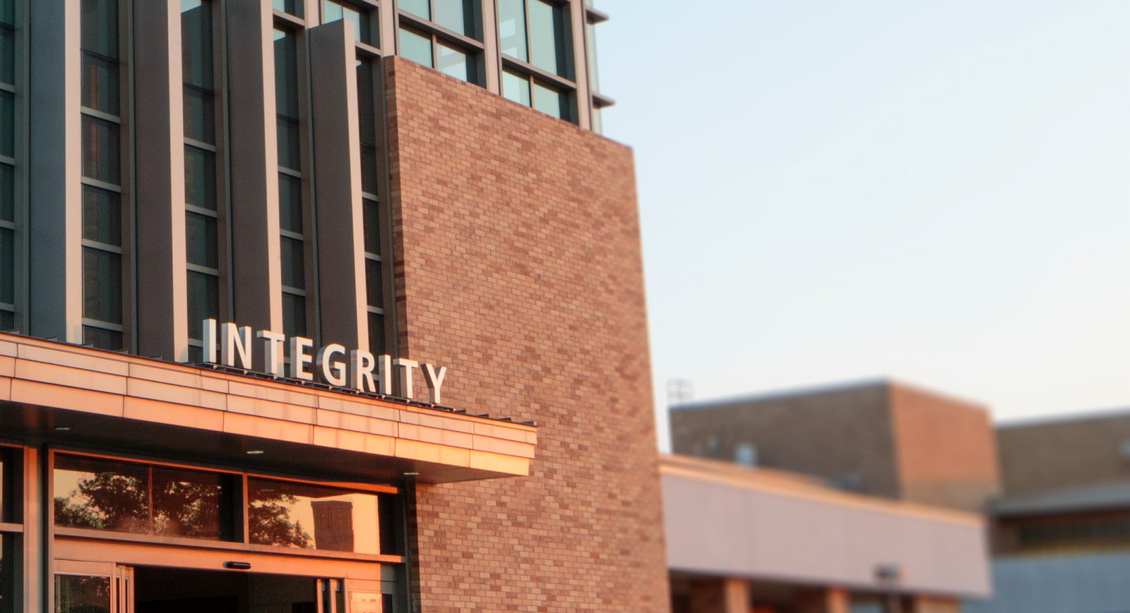 Photo of Texas A&M University Memorial Student Center entrance with the word Integrity about it